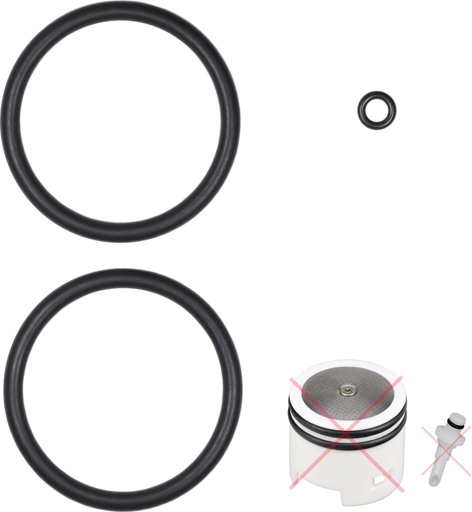 A set of rubber O-rings and a cylindrical component with a mesh top.