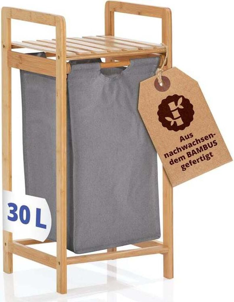 A bamboo laundry basket with a gray fabric liner and a wooden shelf on top.