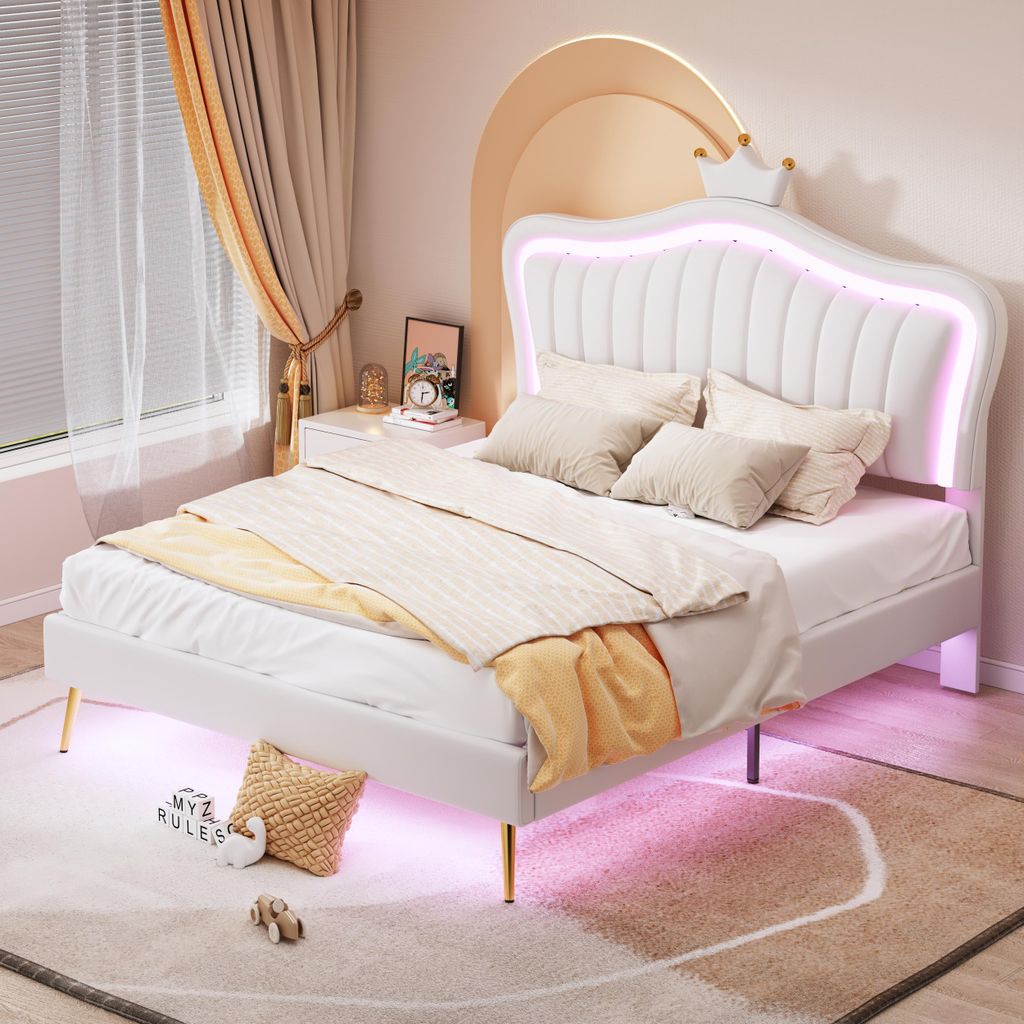 A white bed with a crown-shaped headboard and LED lighting, set in a bedroom with curtains and a rug.