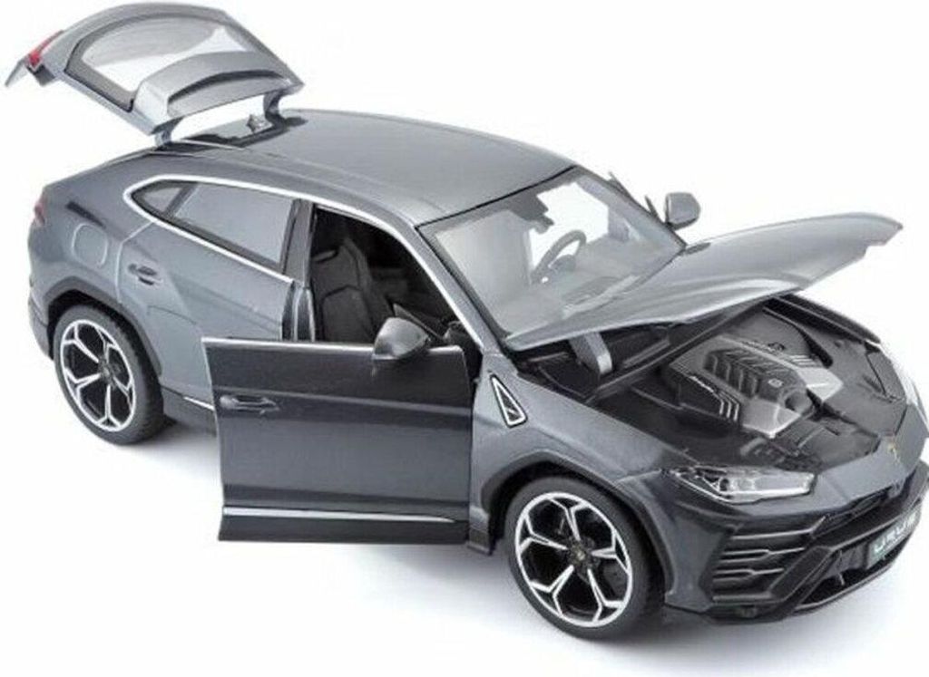 A gray Lamborghini Urus model car with its doors, hood, and rear hatch open, displayed against a white background.