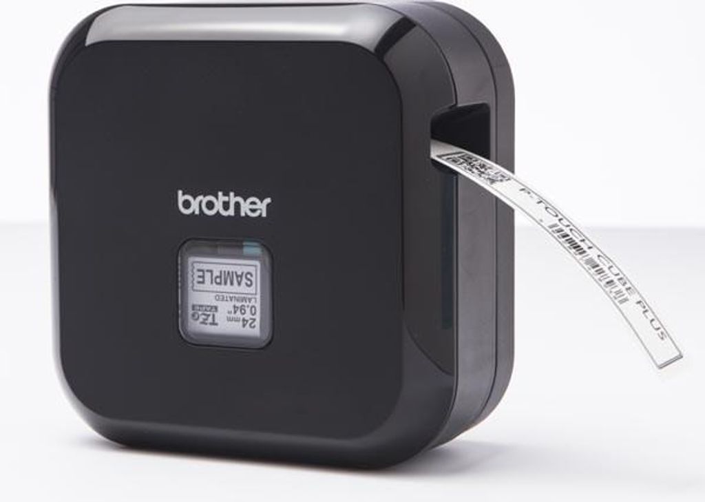 A black Brother P-Touch Cube Plus label maker with a label tape emerging from the side.