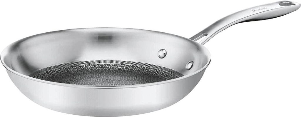 A silver frying pan with a textured interior and a curved handle is shown against a white background.
