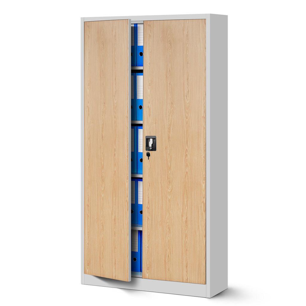 A closed metal filing cabinet with wood-grain doors, showing several blue binders inside one half of the cabinet.