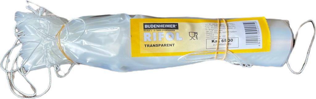 A roll of clear plastic casing for sausages, secured with rubber bands and a label.