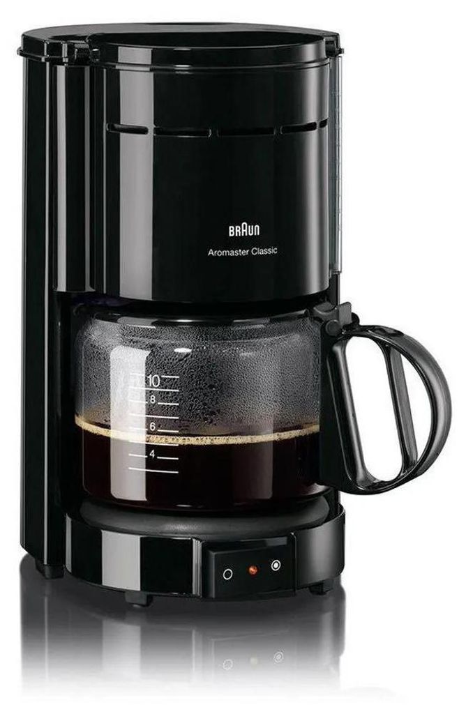 A black Braun coffee maker with a glass carafe filled with coffee.