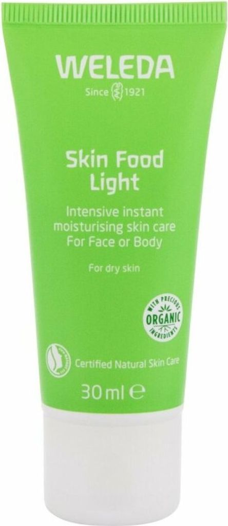 A product shot of a green tube of Weleda Skin Food Light moisturizer.