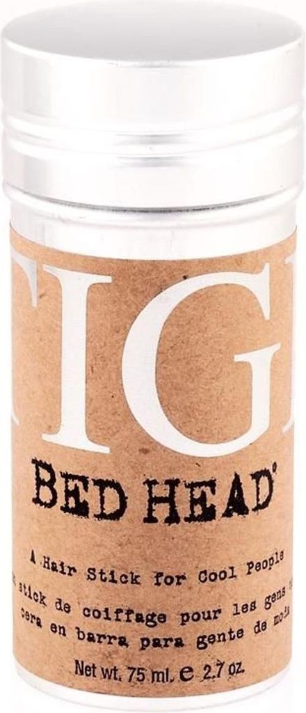 A close-up studio shot of a Tigi Bed Head hair styling stick.
