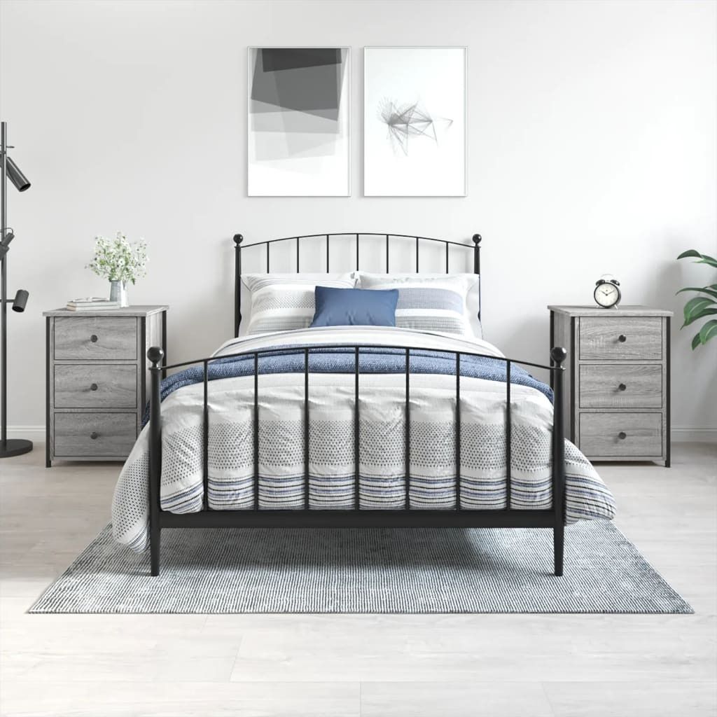 A bedroom scene with a bed and two nightstands.