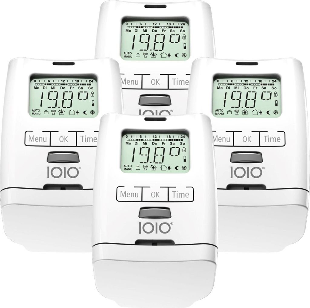 A group of four electronic radiator thermostats arranged in a cluster.