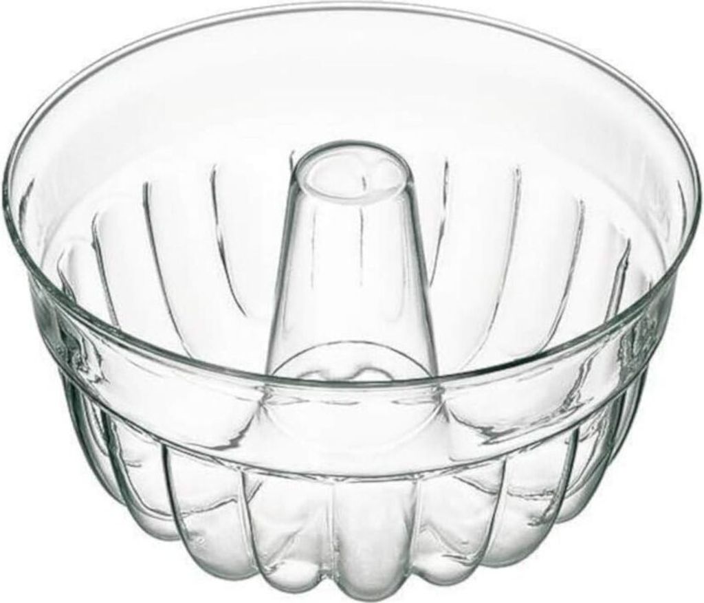 A clear glass bundt cake pan is shown from a slightly elevated angle against a white background.