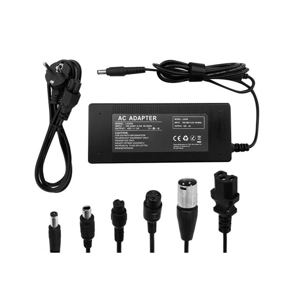 An AC adapter with multiple interchangeable connectors and its power cord, laid out on a white background.