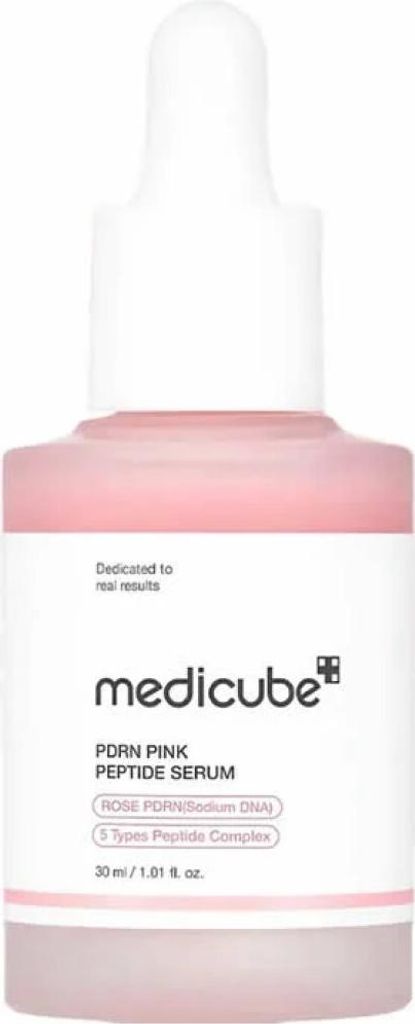 A product shot of a pink serum bottle with a dropper.