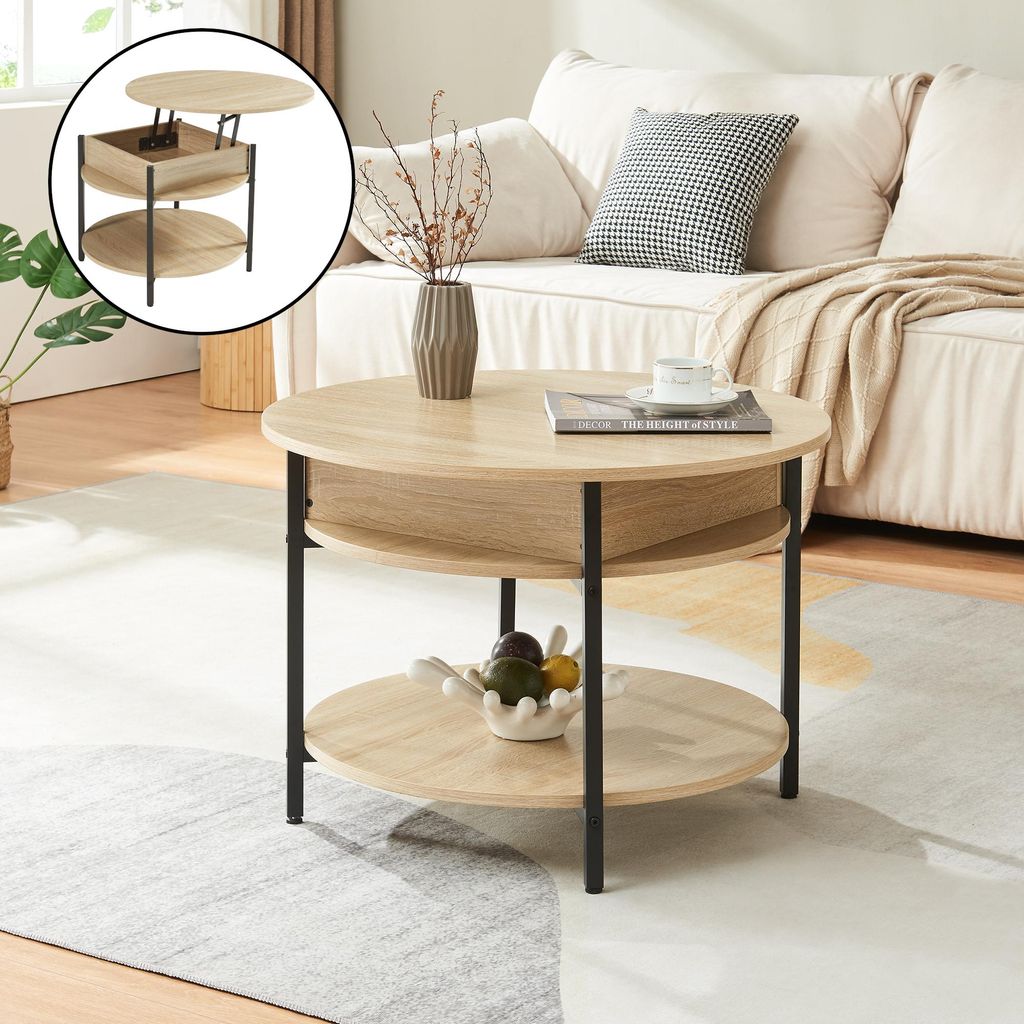 A round coffee table with a lift-top feature is shown in a living room setting, next to a sofa.