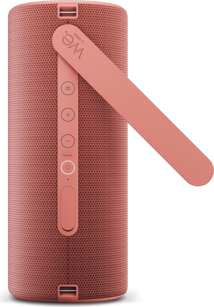 A close-up, studio shot of a coral red Bluetooth speaker.