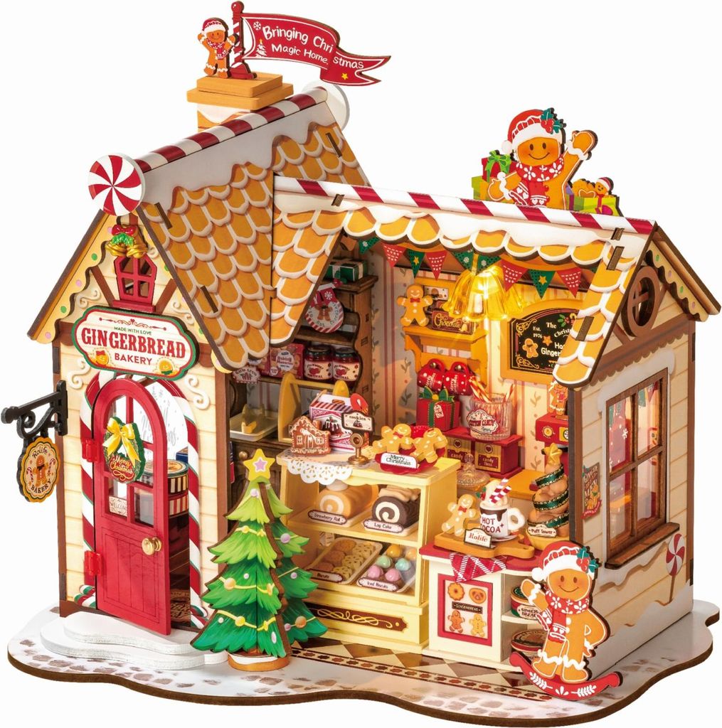 A 3D wooden puzzle model of a gingerbread bakery decorated for Christmas.