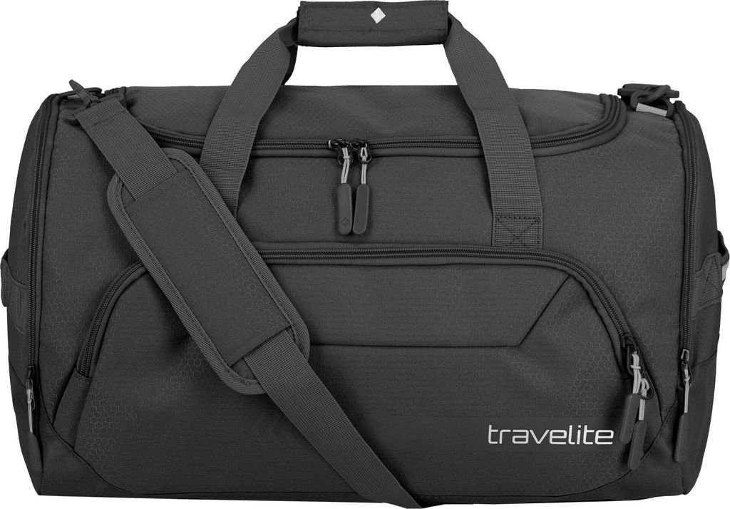 A black duffel bag with the brand name 'travelite' visible.