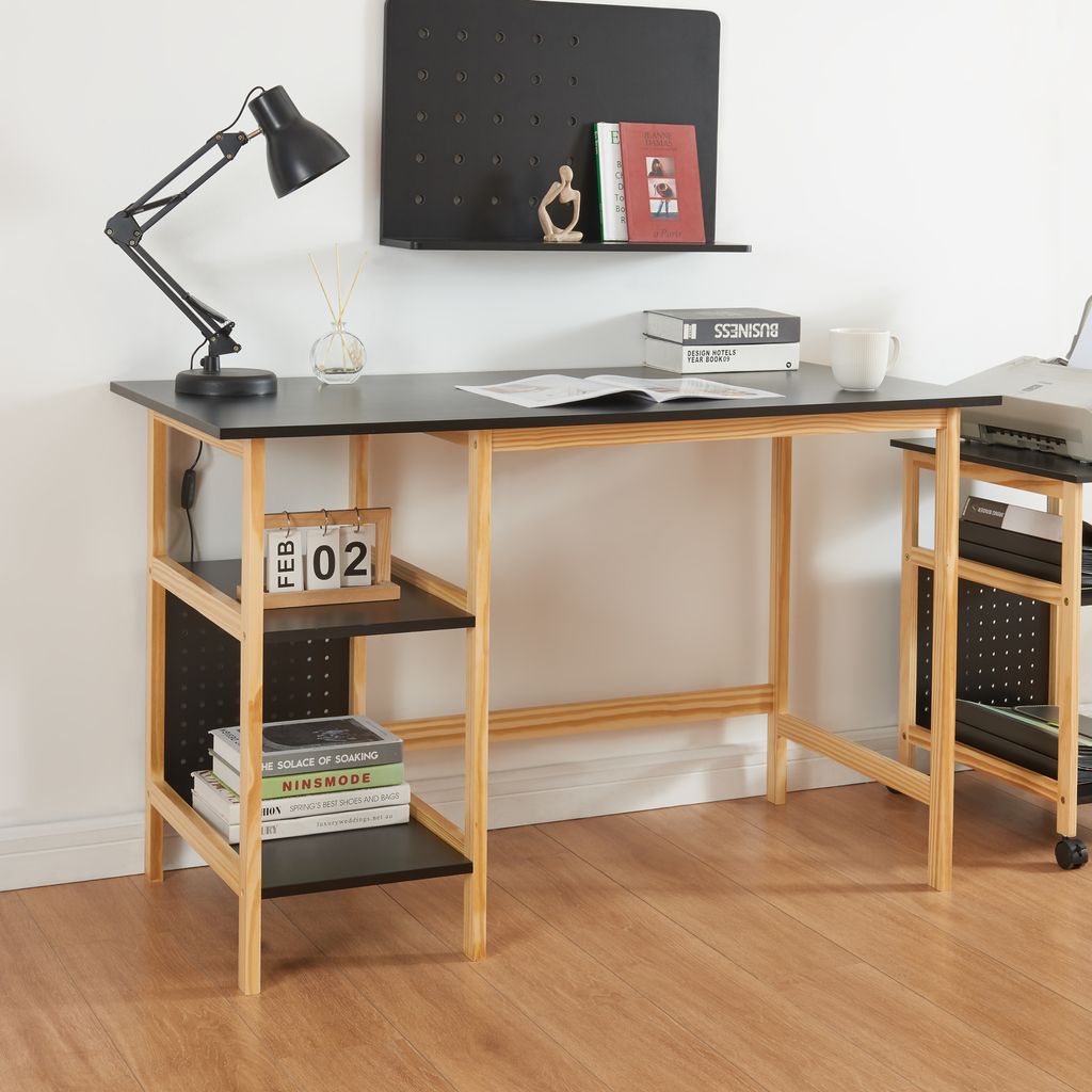 A desk with shelves and a lamp.