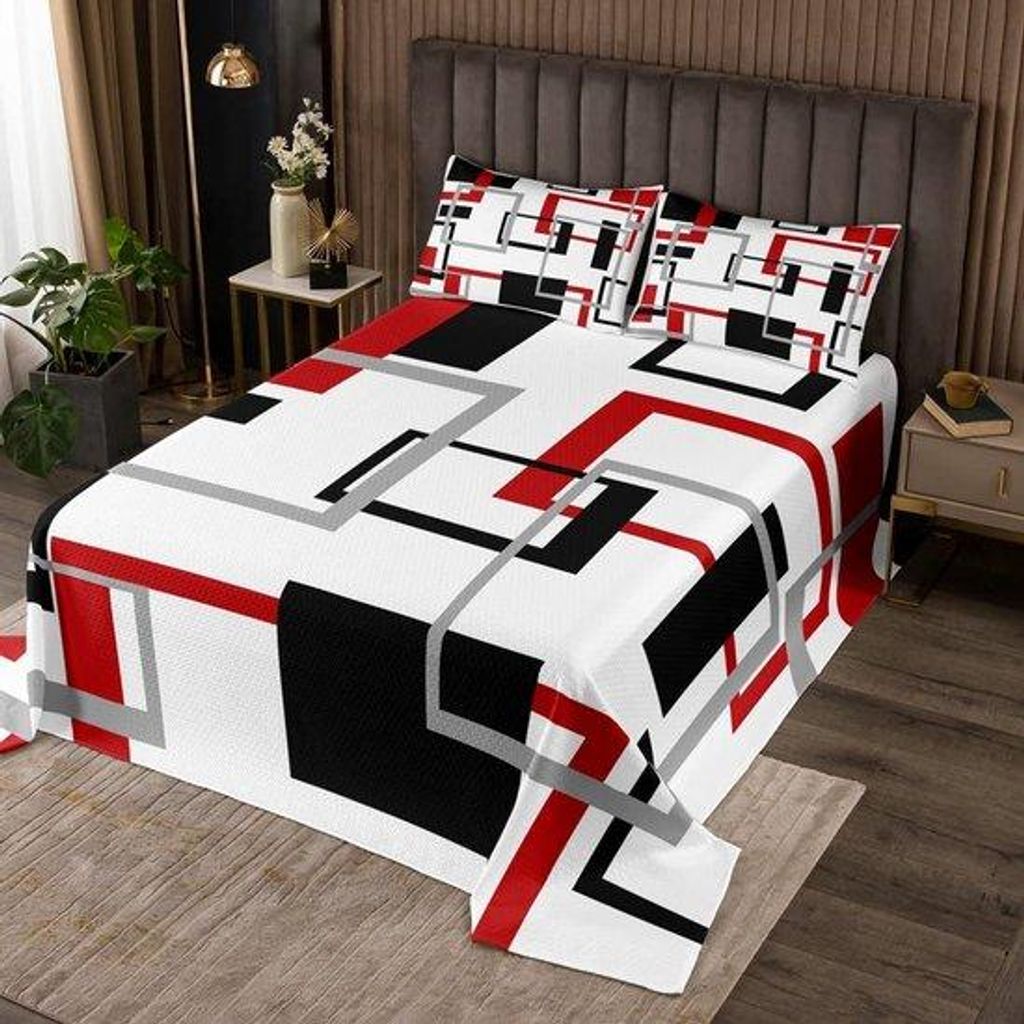 Kinderdekbed mit geometrischen Mustern in verschiedenen Farben