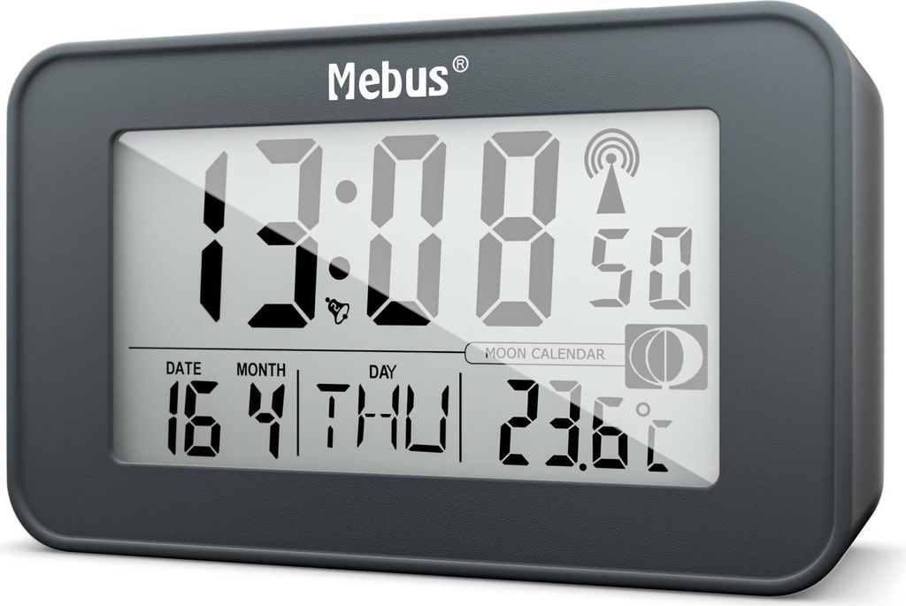 A digital alarm clock displaying the time, date, and temperature.