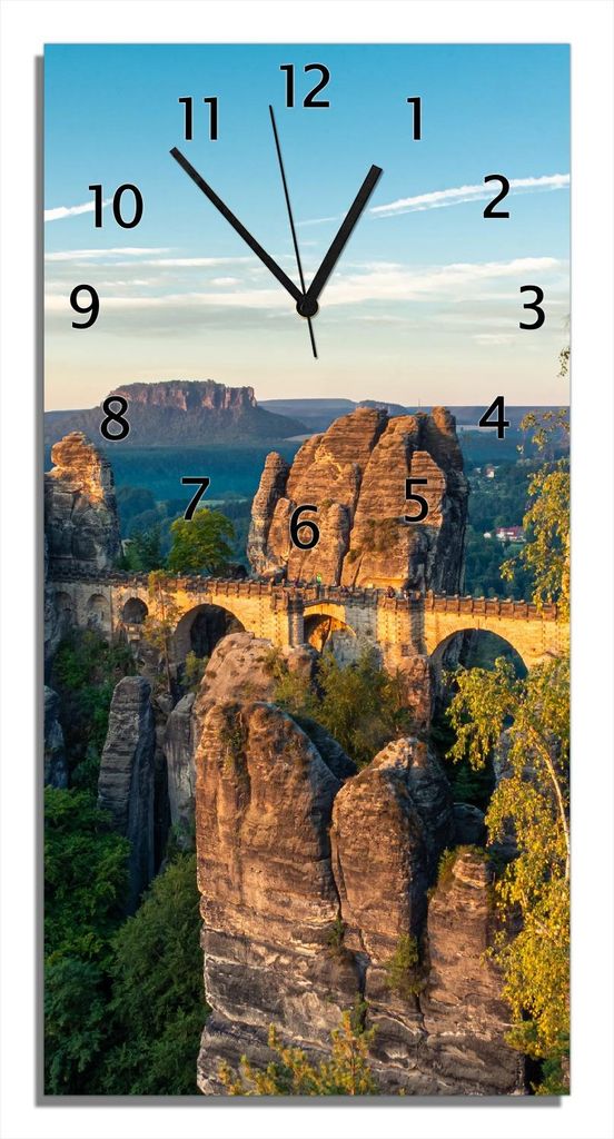 Wallario Design Wanduhr bedruckt, Größe 30 x 60 cm, Motiv: Steinerne Brücke in der Landschaft