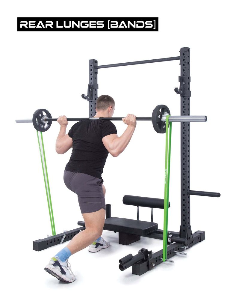 Atletica R7 Rider | Plate Load-versie | Squat rack met geïntegreerde lat-pulldown. Modulair uitbreidbaar met deadlift station. Beschikbaar in twee hoogtes. Optioneel met 125 kg inzetgewichten