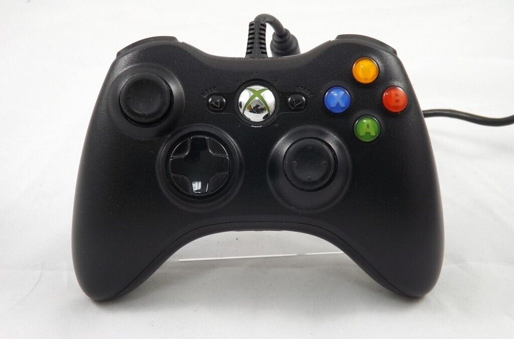 A black Xbox 360 controller is shown from a front-facing perspective against a white background.