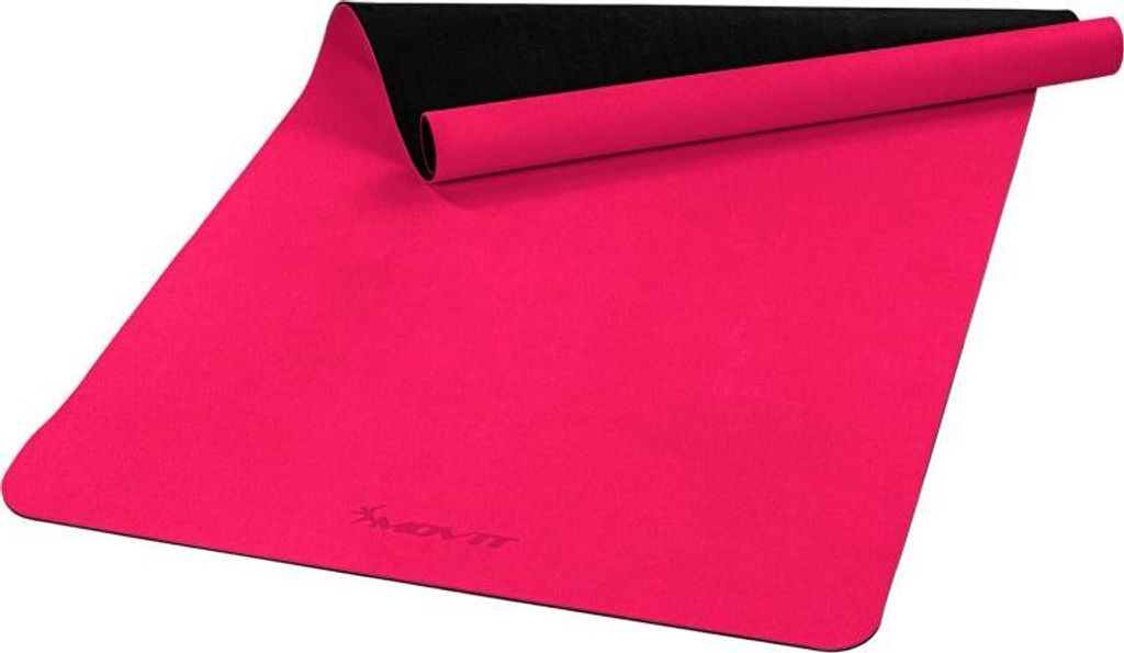 A pink yoga mat is partially unrolled on a white background.