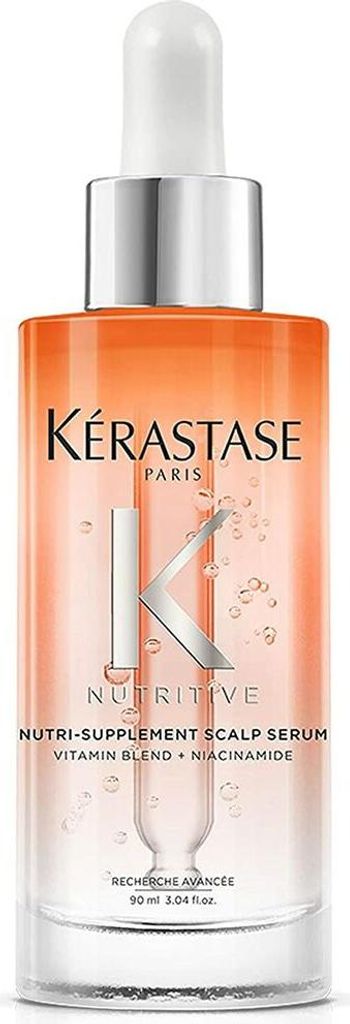 A product shot of a Kérastase scalp serum bottle.