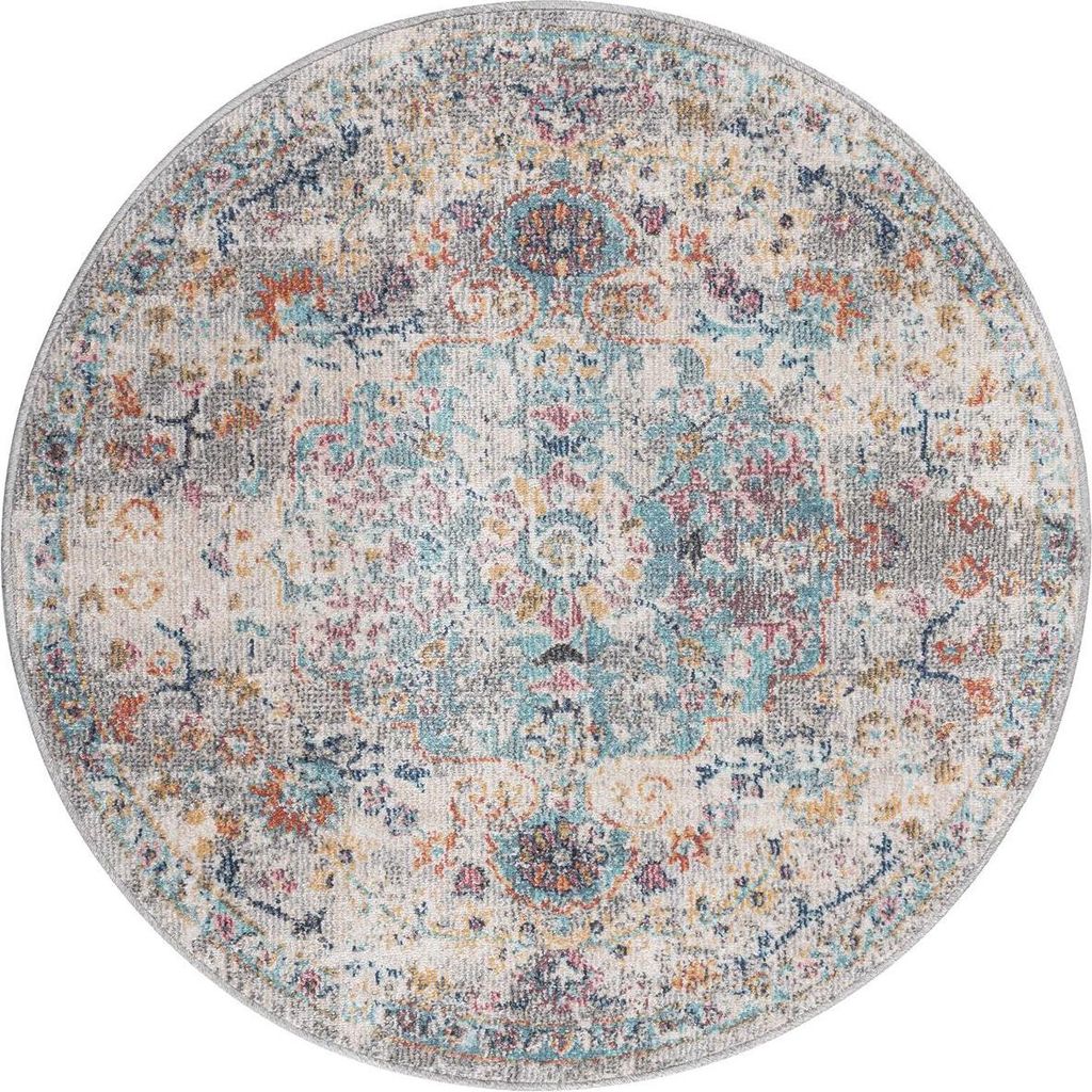 A round rug with a vintage-style pattern.