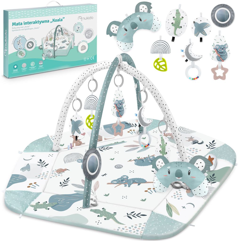 A product shot of a baby play mat and its packaging, with various accessories displayed.