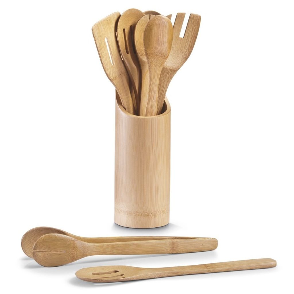 A set of bamboo kitchen utensils in a holder, with a pair of tongs and a slotted spoon in the foreground.