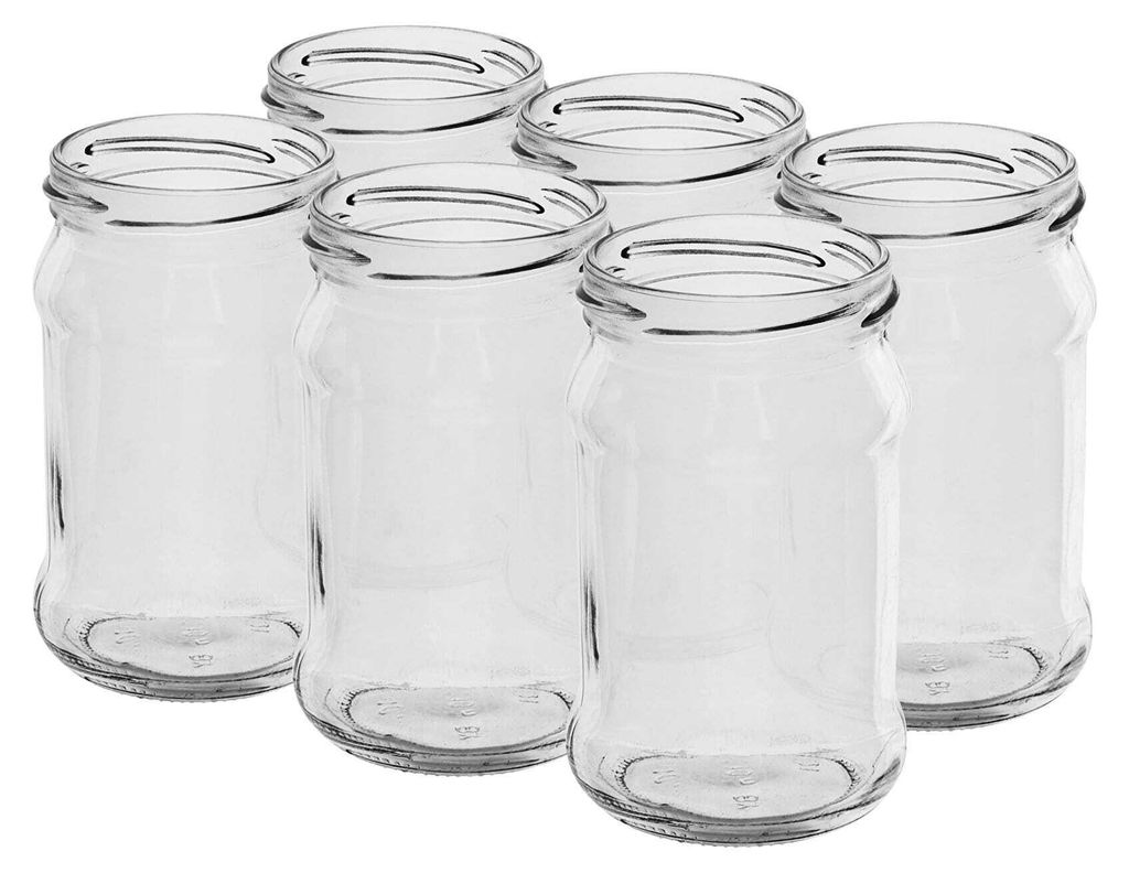 A group of empty glass jars.