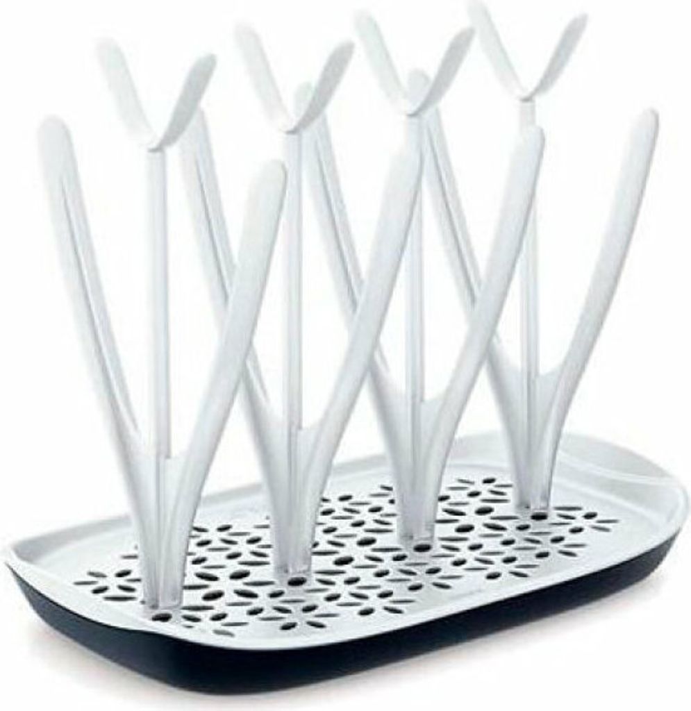 A white and black bottle drying rack with multiple prongs for drying bottles and accessories.