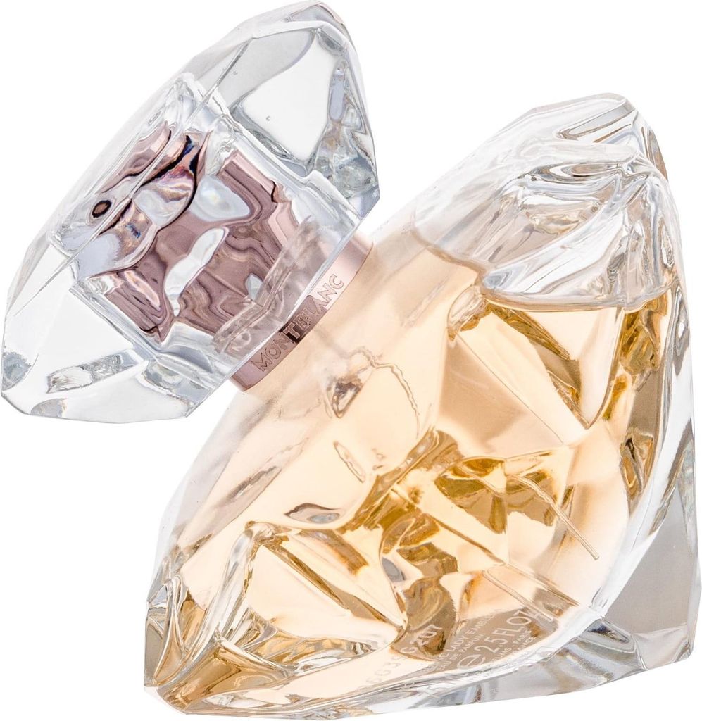 A close-up shot of a diamond-shaped perfume bottle with a light gold liquid inside.