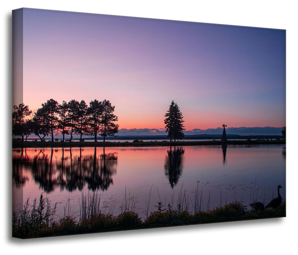 Leinwanddruck Sonnenuntergang über dem Wasser 70x50 cm