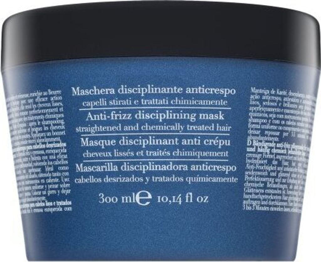 The image shows the back of a dark blue hair mask container with text in multiple languages.