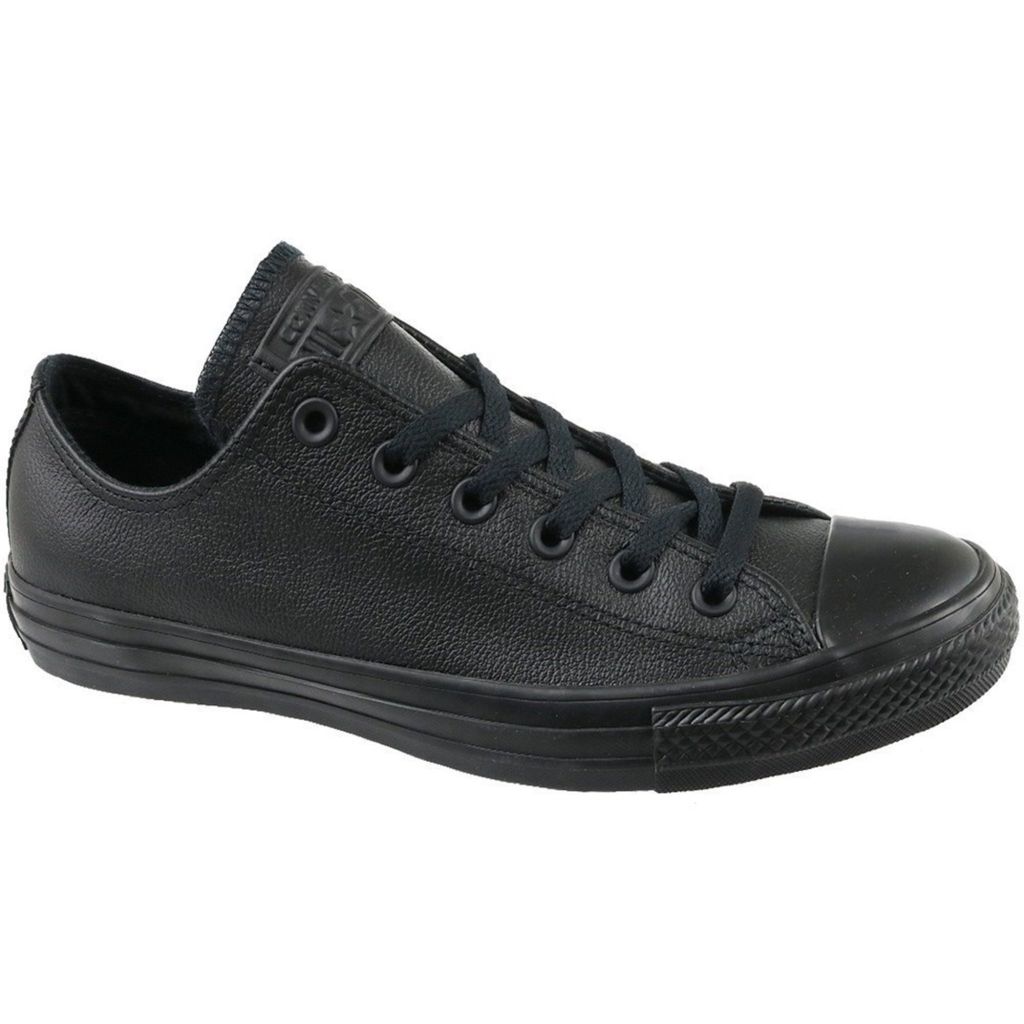 A black leather Converse Chuck Taylor All Star low-top sneaker is shown against a white background.