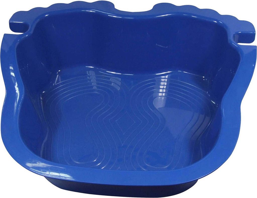 A blue foot bath with textured interior.