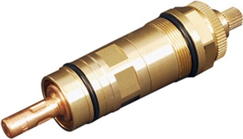 A close-up studio shot of a brass faucet cartridge.