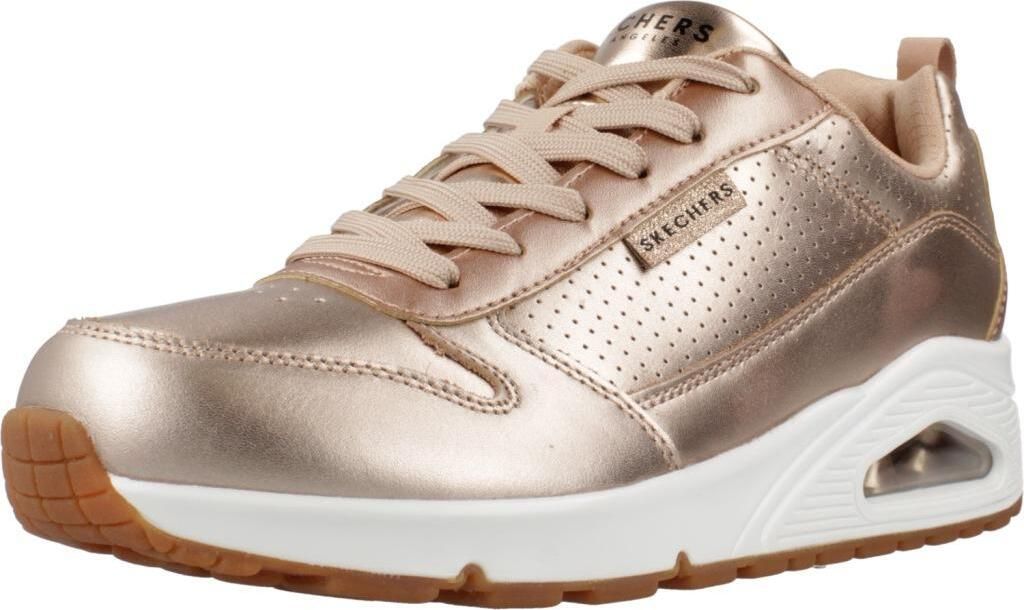 A single rose gold Skechers Uno-Metallixs sneaker is shown from a side angle against a white background.