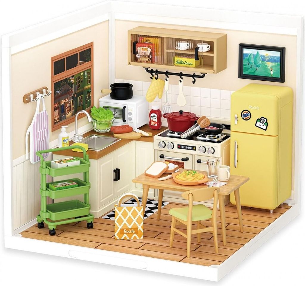A miniature dollhouse kitchen scene with furniture and accessories.