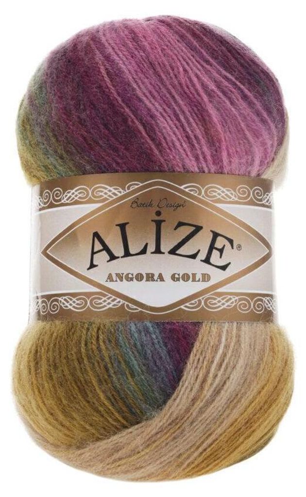 A ball of multi-colored yarn on a white background.