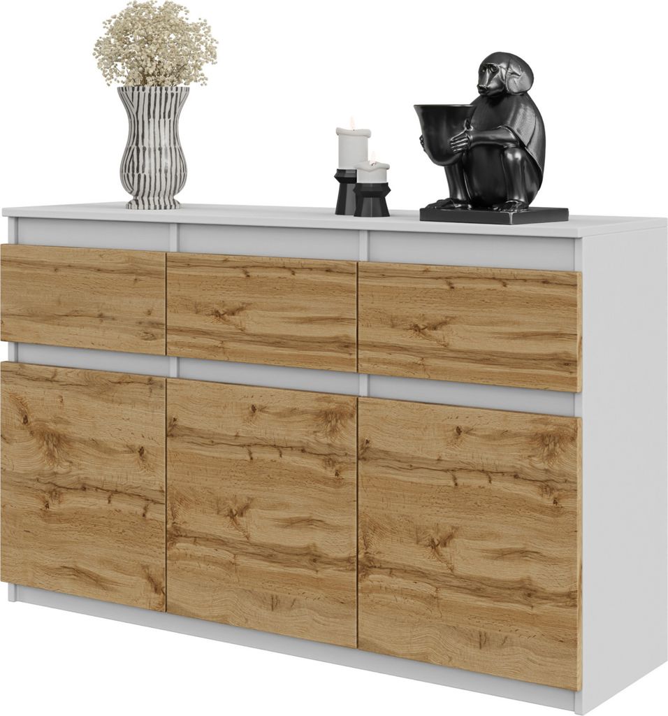 A white and wood-grain sideboard with decorative items on top.
