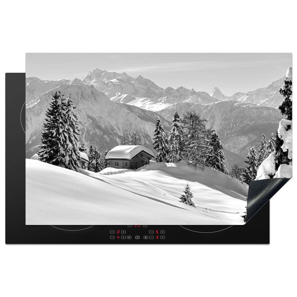 KitchenYeah Herdabdeckplatte Hütte in der Winterlandschaft der Schweiz - schwarz und weiß , 80x52cm, Küche Deko, Glaskeramikkochfeld Herdabdec...