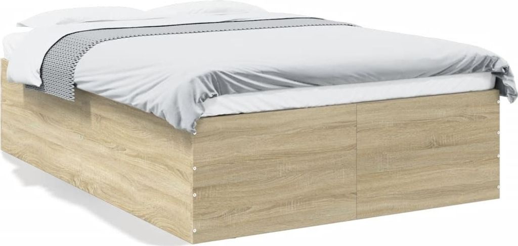 A bed frame with white bedding.