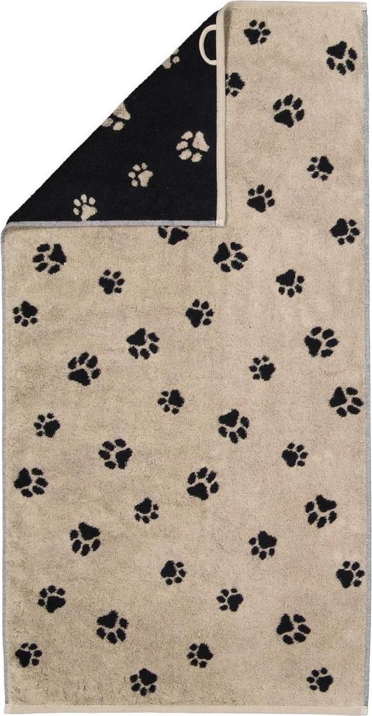 A folded towel with a paw print pattern.