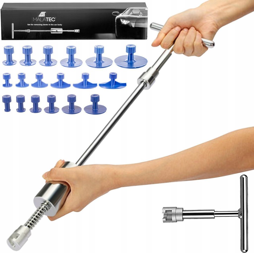 A hand holding a dent puller tool with various suction cups laid out.