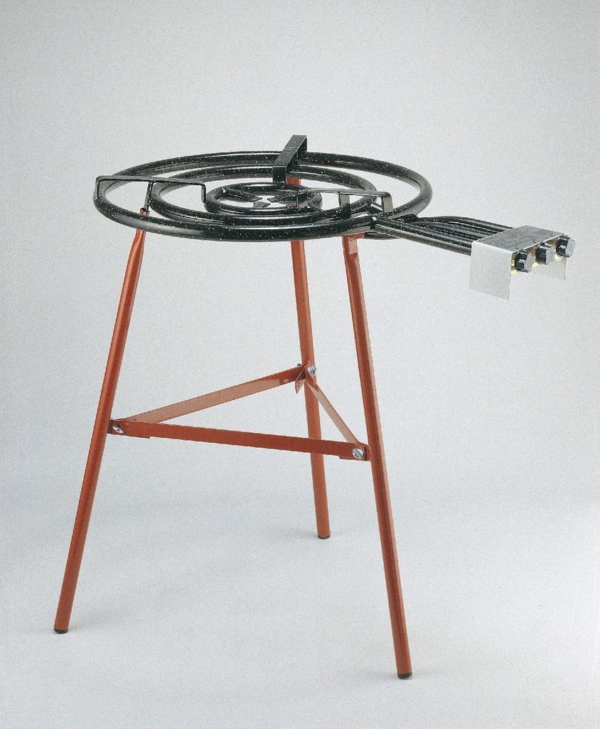 A paella burner stand with a coiled burner on top, set against a plain white background.