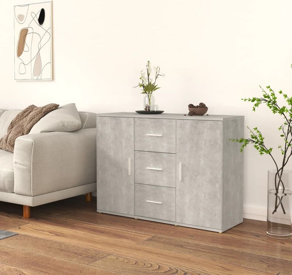 A modern living room scene with a grey sideboard and a sofa.