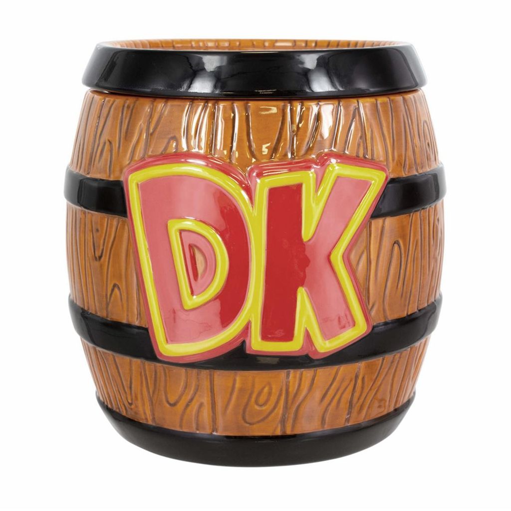 A barrel-shaped cookie jar with the letters 'DK' on the front.